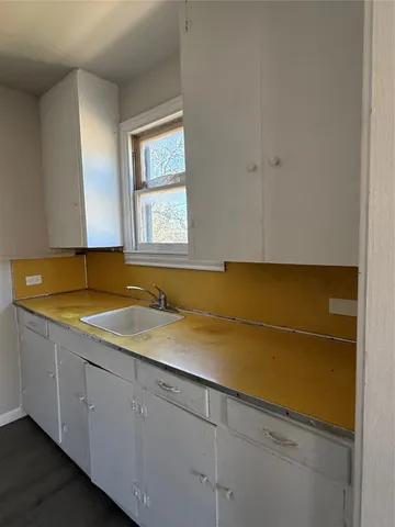 a bathroom with a sink and a bathtub