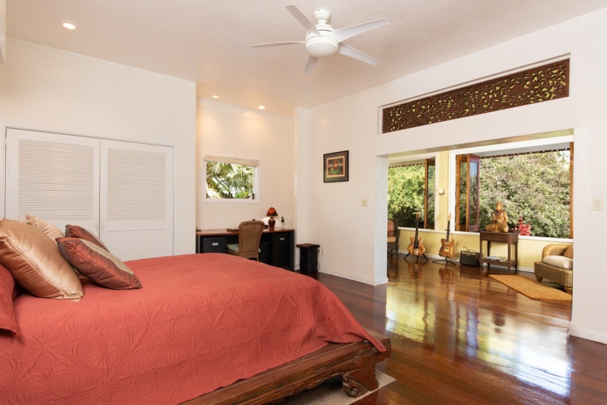 44-2325 Middle Road Honokaa, HI 96727 - Photo 14 of 28 a bedroom with a bed and a large window