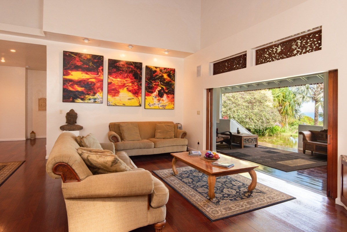 44-2325 Middle Road Honokaa, HI 96727 - Photo 5 of 28 a living room with furniture a rug and a large window