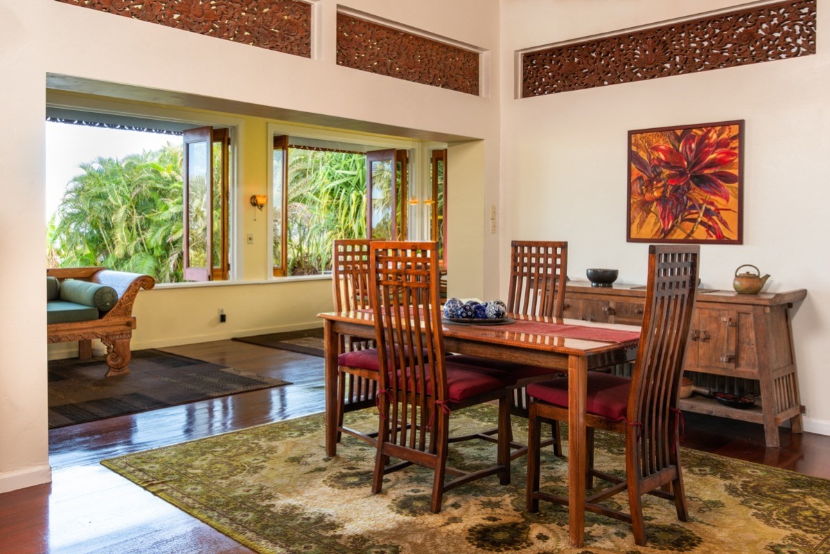 44-2325 Middle Road Honokaa, HI 96727 - Photo 6 of 28 a view of a dining room with furniture window and wooden floor