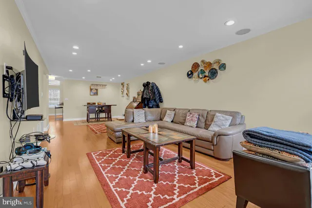 a living room with furniture and a table