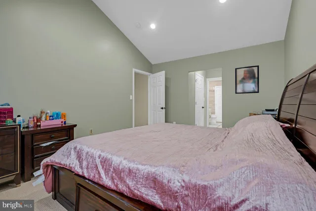 a bathroom with a shower and a sink