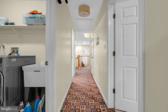 a view of a hallway with windows