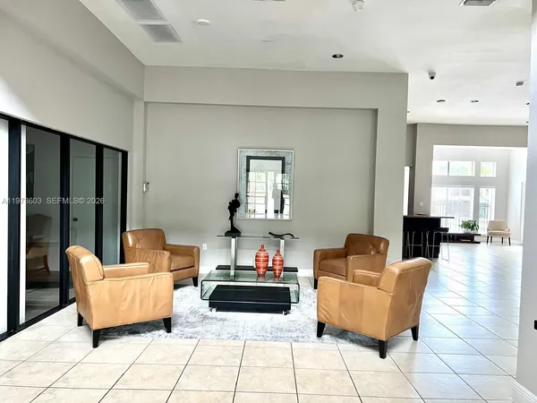 a living room with furniture and a couch