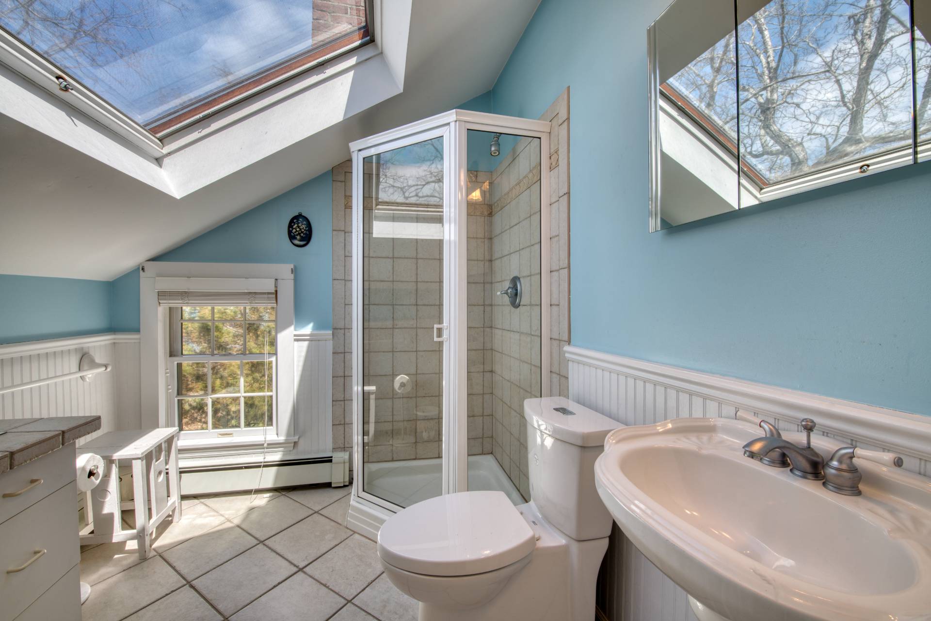 201 Three Mile Harbor Road East Hampton, NY 11937 - Photo 15 of 19 a bathroom with a sink a toilet and shower