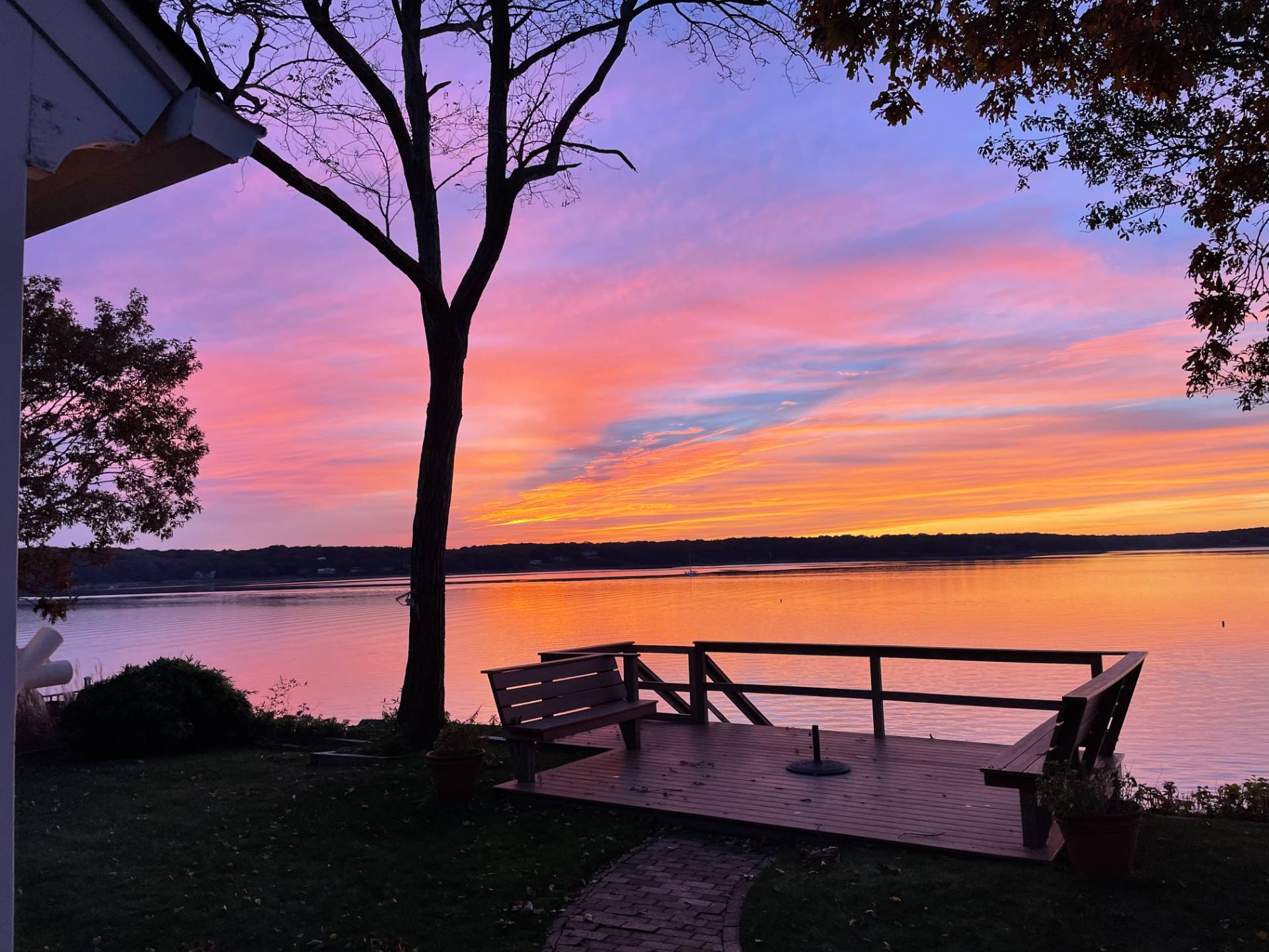 201 Three Mile Harbor Road East Hampton, NY 11937 - Photo 18 of 19 a view of a lake with a mountain in the background