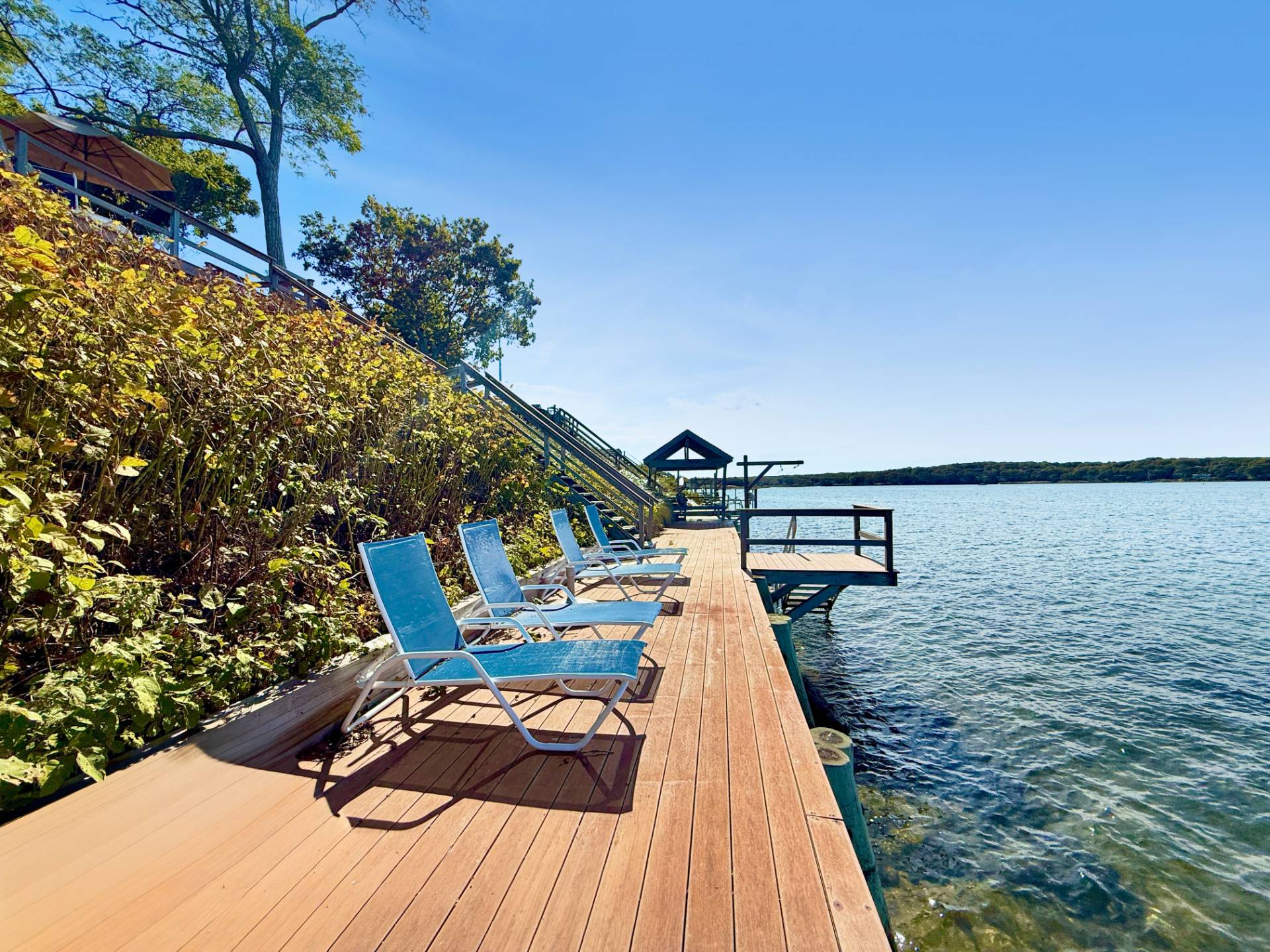 201 Three Mile Harbor Road East Hampton, NY 11937 - Photo 6 of 19 a view of a terrace with sitting area