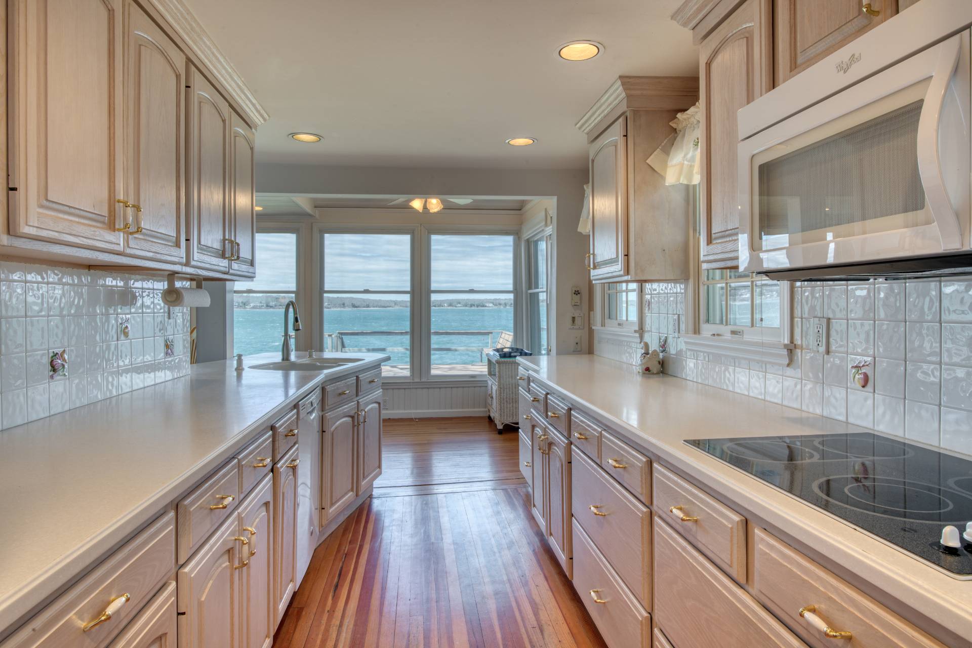201 Three Mile Harbor Road East Hampton, NY 11937 - Photo 10 of 19 a view of a kitchen with a large window
