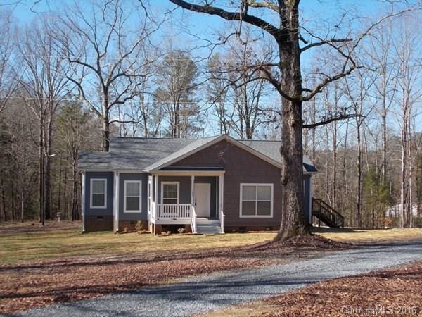 1604 Old Pardue Road Lancaster, SC 29720 - Photo 1 of 17 a front view of a house with garden