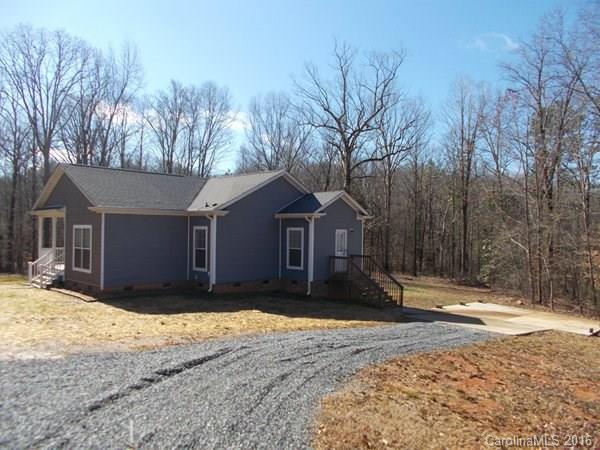 1604 Old Pardue Road Lancaster, SC 29720 - Photo 2 of 17 a wooden house with trees in the background