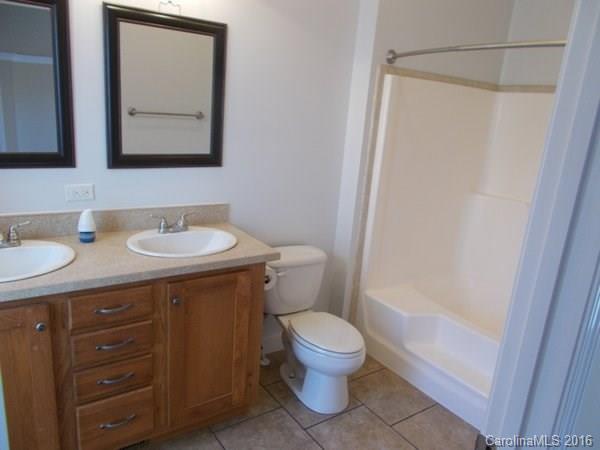 1604 Old Pardue Road Lancaster, SC 29720 - Photo 12 of 17 a bathroom with a sink a toilet and shower