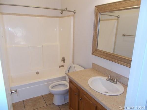 1604 Old Pardue Road Lancaster, SC 29720 - Photo 16 of 17 a bathroom with a sink a toilet and shower