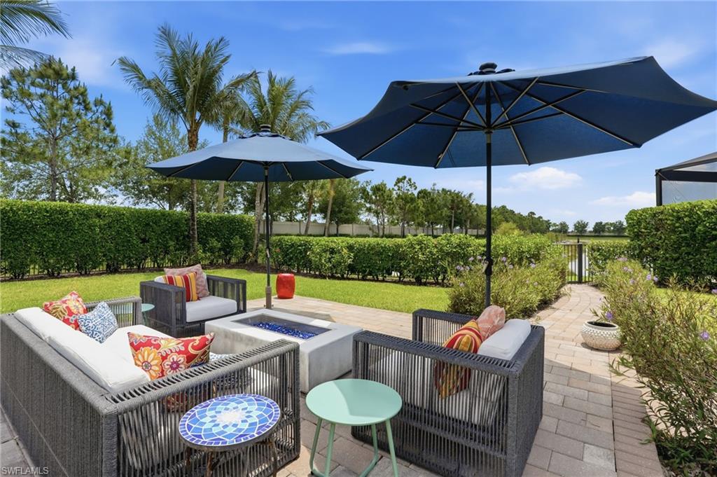 4220 Amelia Way Naples, FL 34119 - Photo 44 of 50 a outdoor view with a seating space