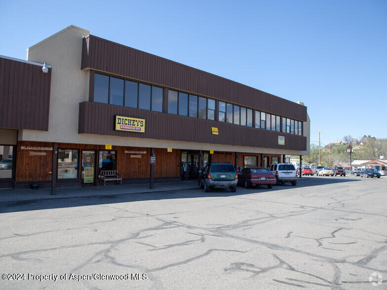 125 West 4th Street, Unit 210 Rifle, CO 81650 - Photo 1 of 8 a view of a building with a street