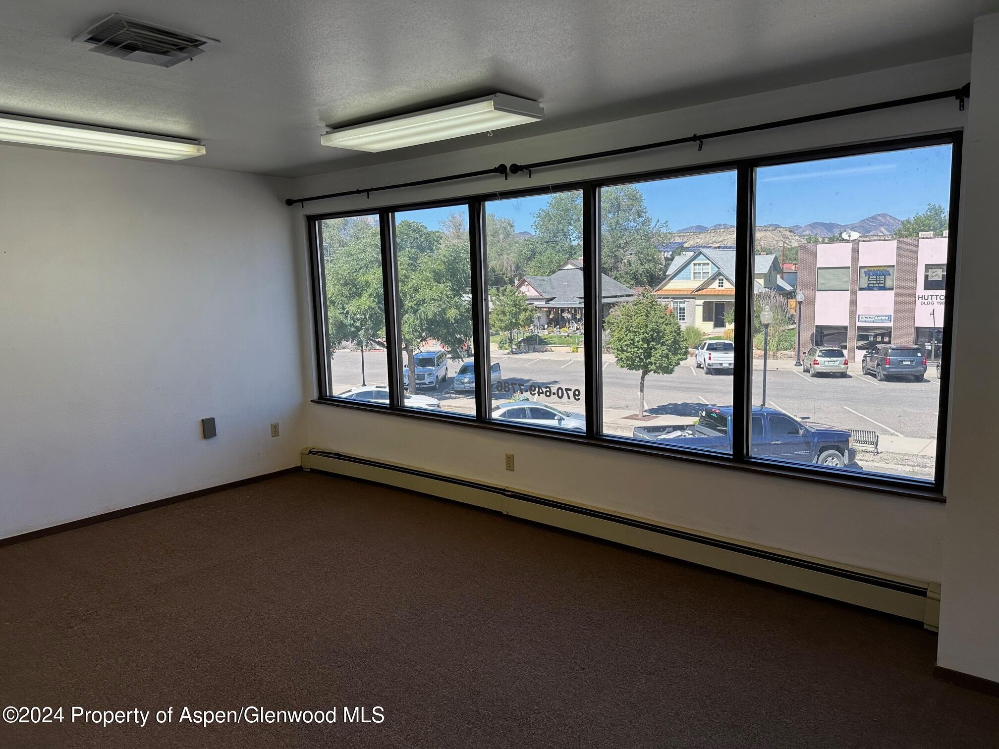 125 West 4th Street, Unit 210 Rifle, CO 81650 - Photo 2 of 8 a view of a large window with an outdoor space