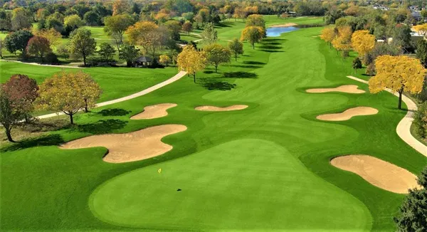 a view of a golf course with a swimming pool