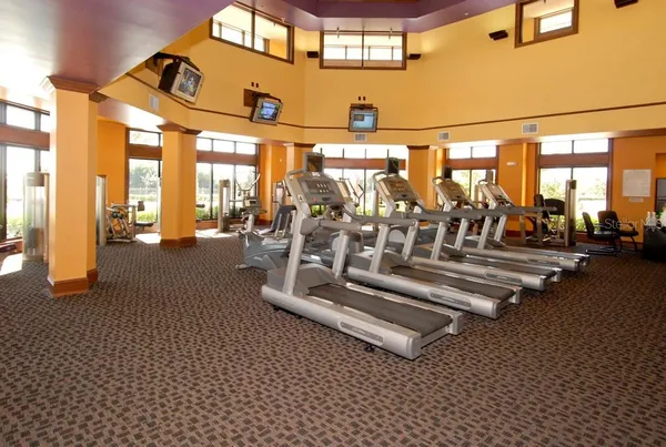 a view of a gym with an entryway