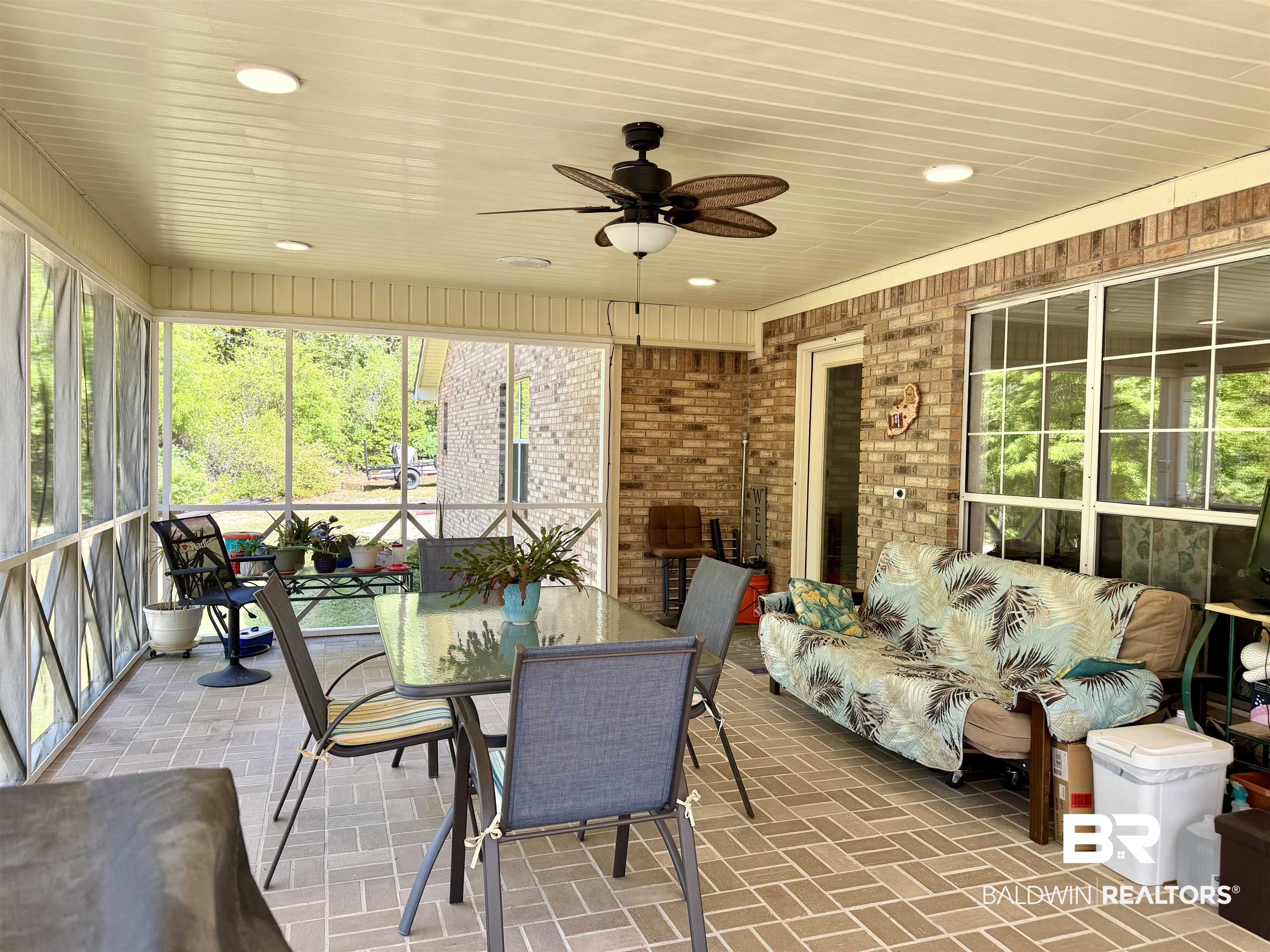 2944 Appleton Road Brewton, AL 36426 - Photo 35 of 65 Sunroom / solarium featuring ceiling fan and outdoor dining area