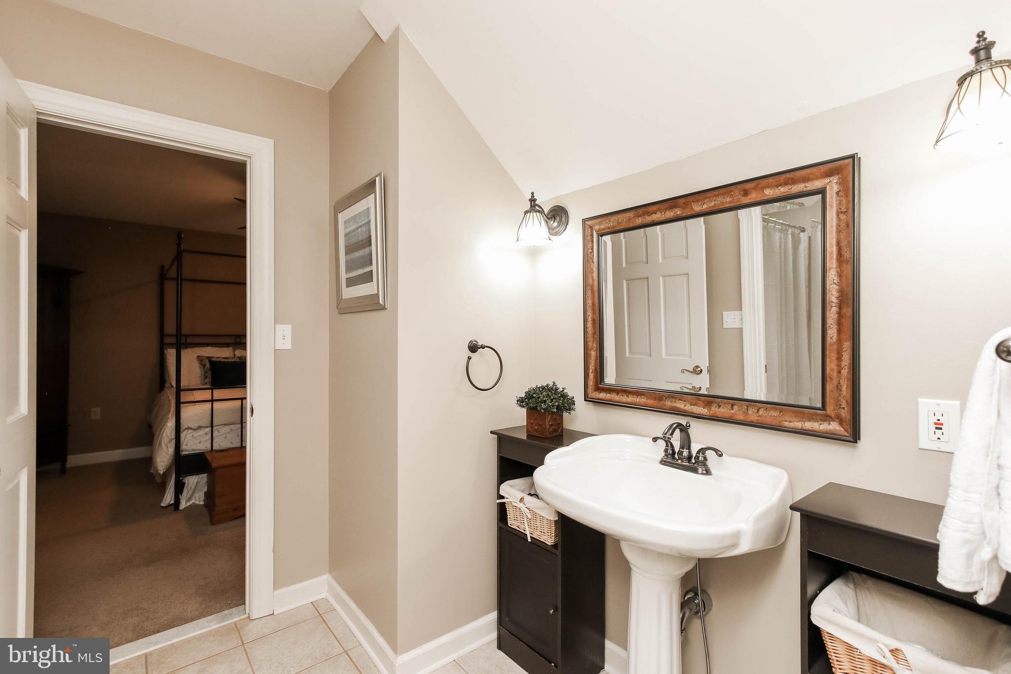 8240 Edgewood Church Road Frederick, MD 21702 - Photo 24 of 44 Jack and Jill Bathroom connects bedrooms 3 and 4