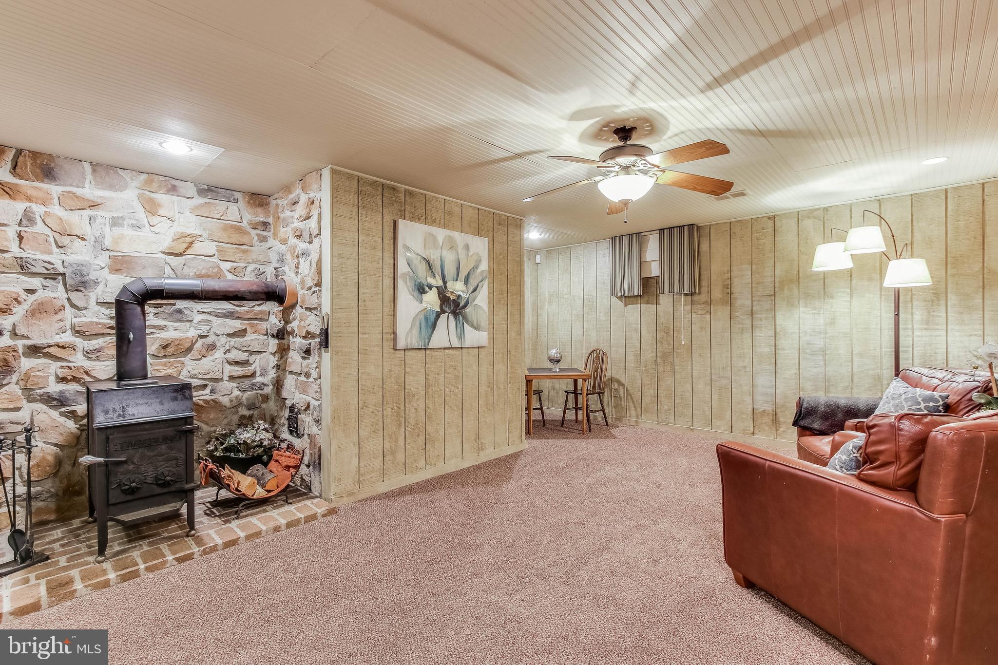 8240 Edgewood Church Road Frederick, MD 21702 - Photo 28 of 44 Wood stove in basement