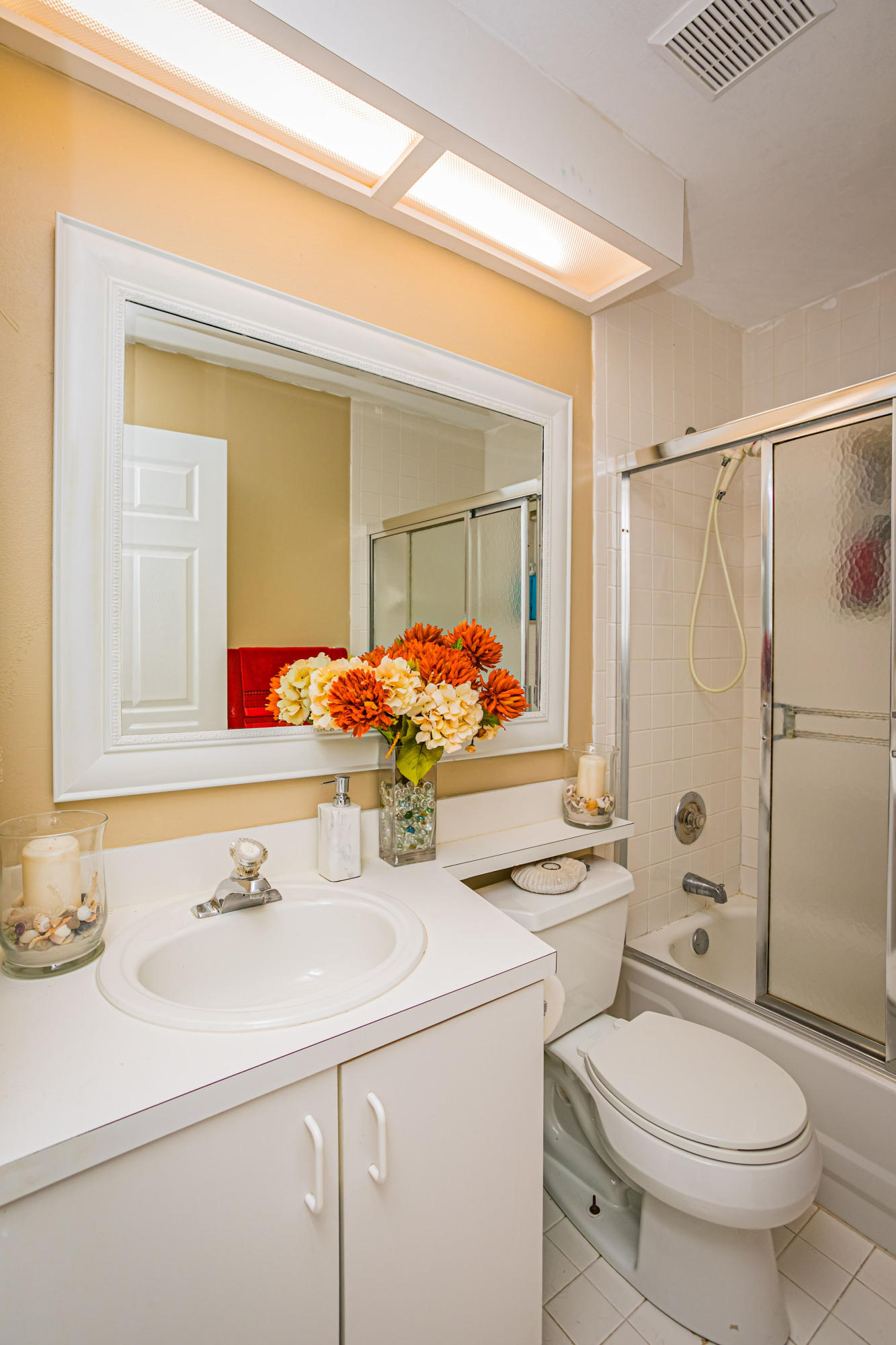 18248 Clear Brook Circle Boca Raton, FL 33498 - Photo 19 of 26 a bathroom with a sink toilet and shower