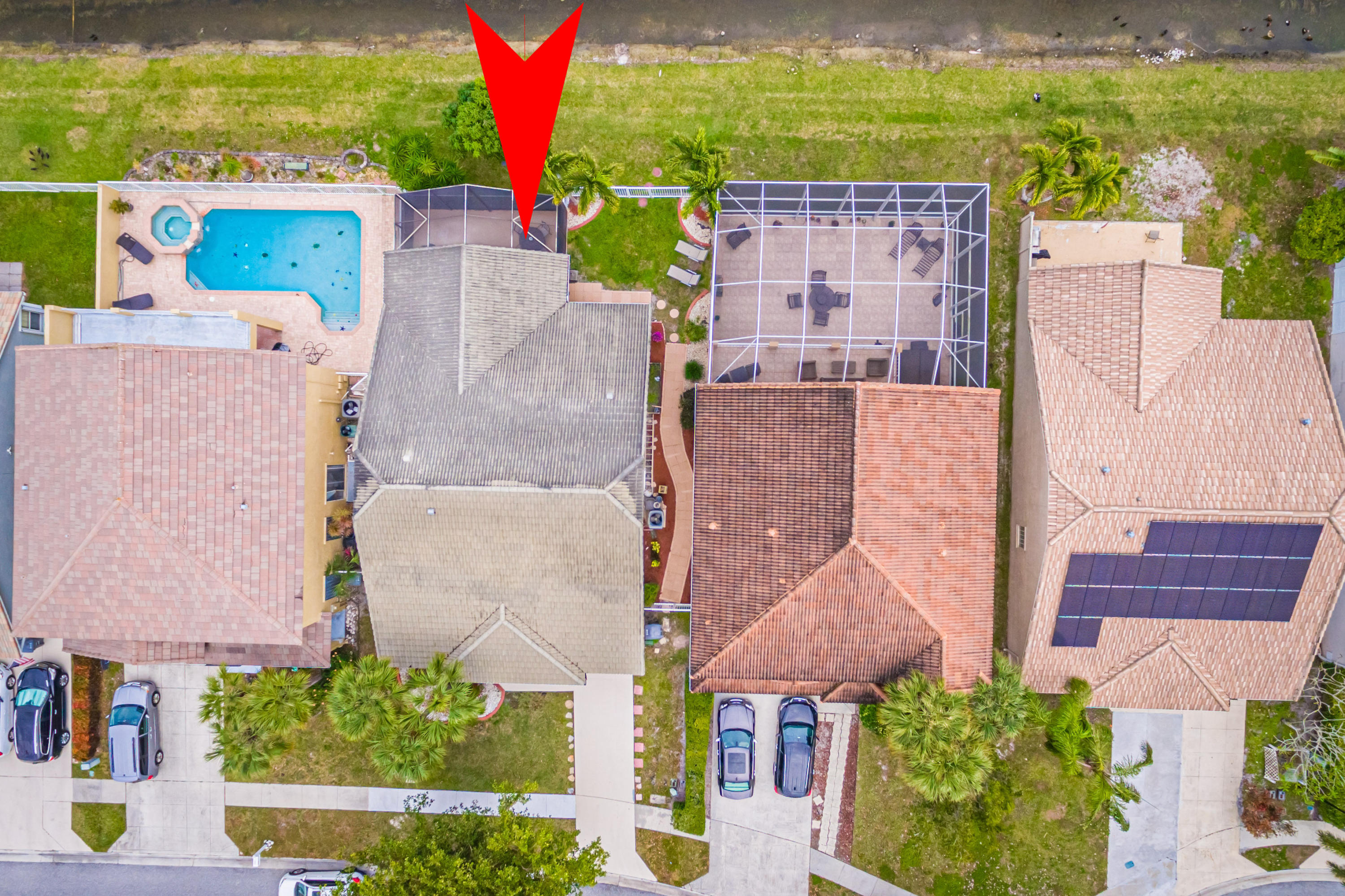 18248 Clear Brook Circle Boca Raton, FL 33498 - Photo 26 of 26 an aerial view of multiple houses with outdoor space