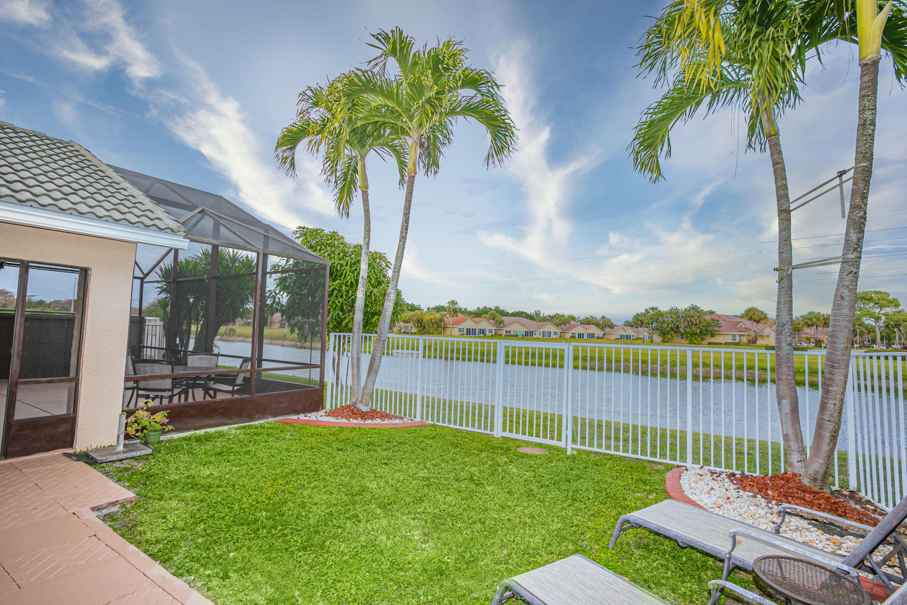 18248 Clear Brook Circle Boca Raton, FL 33498 - Photo 4 of 26 a garden view with a seating space