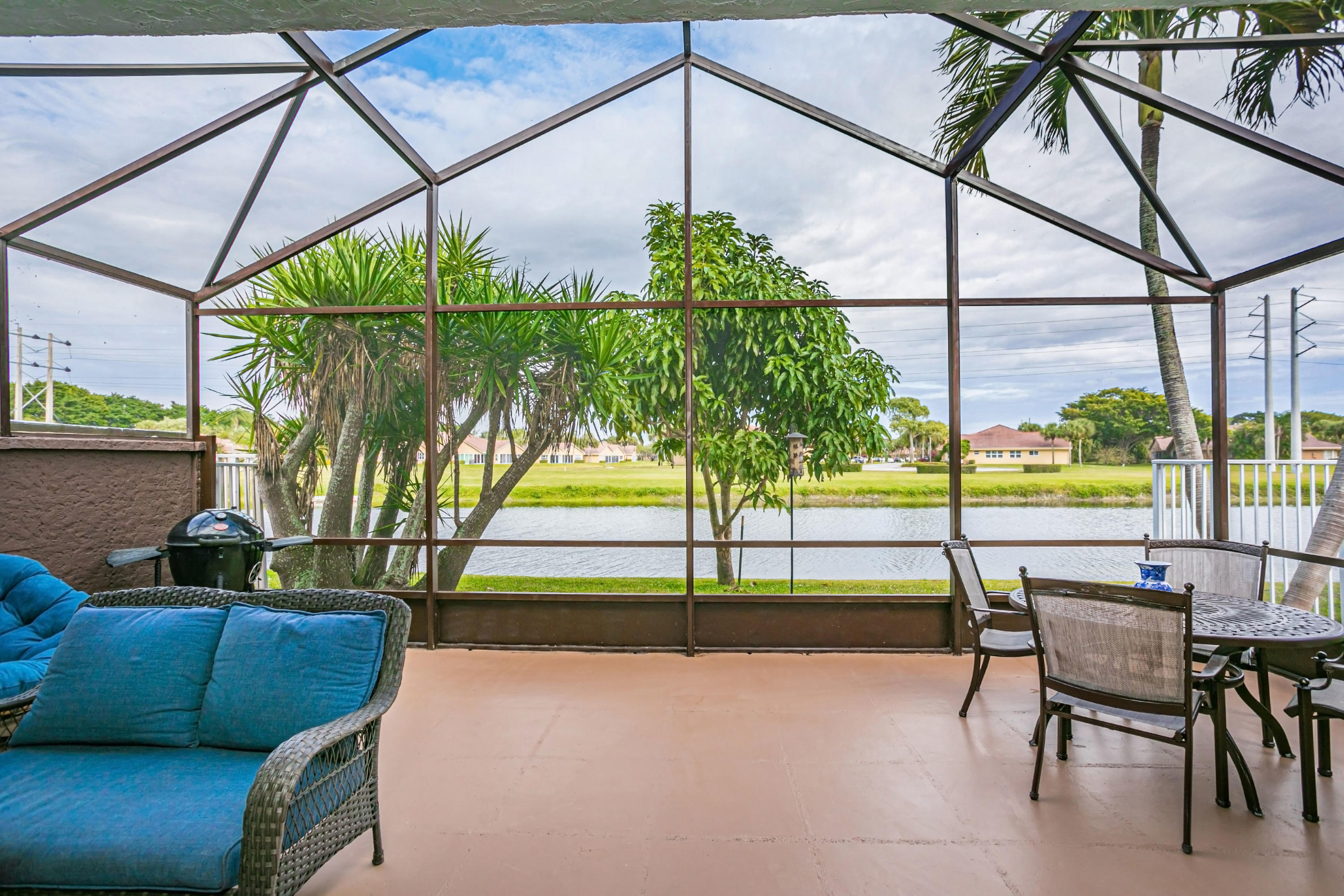 18248 Clear Brook Circle Boca Raton, FL 33498 - Photo 6 of 26 a view of a chairs and table in the patio
