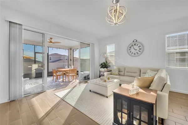 a living room with furniture and a table