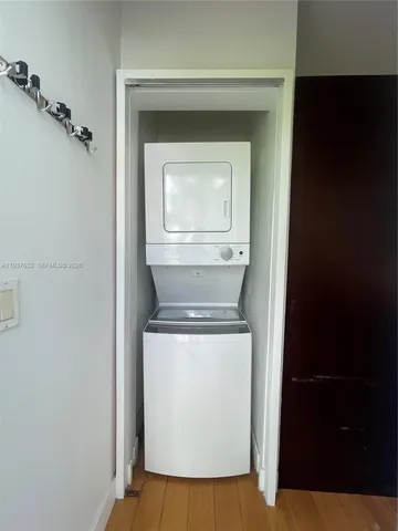 a close view of a utility room with washer and dryer