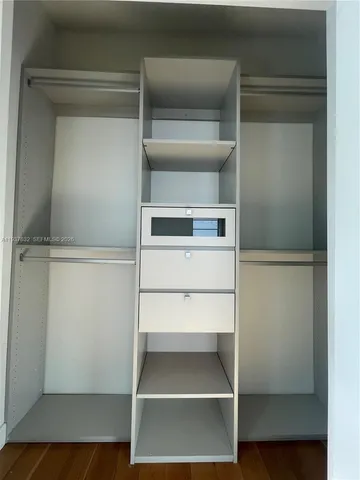 a utility room with washer and dryer