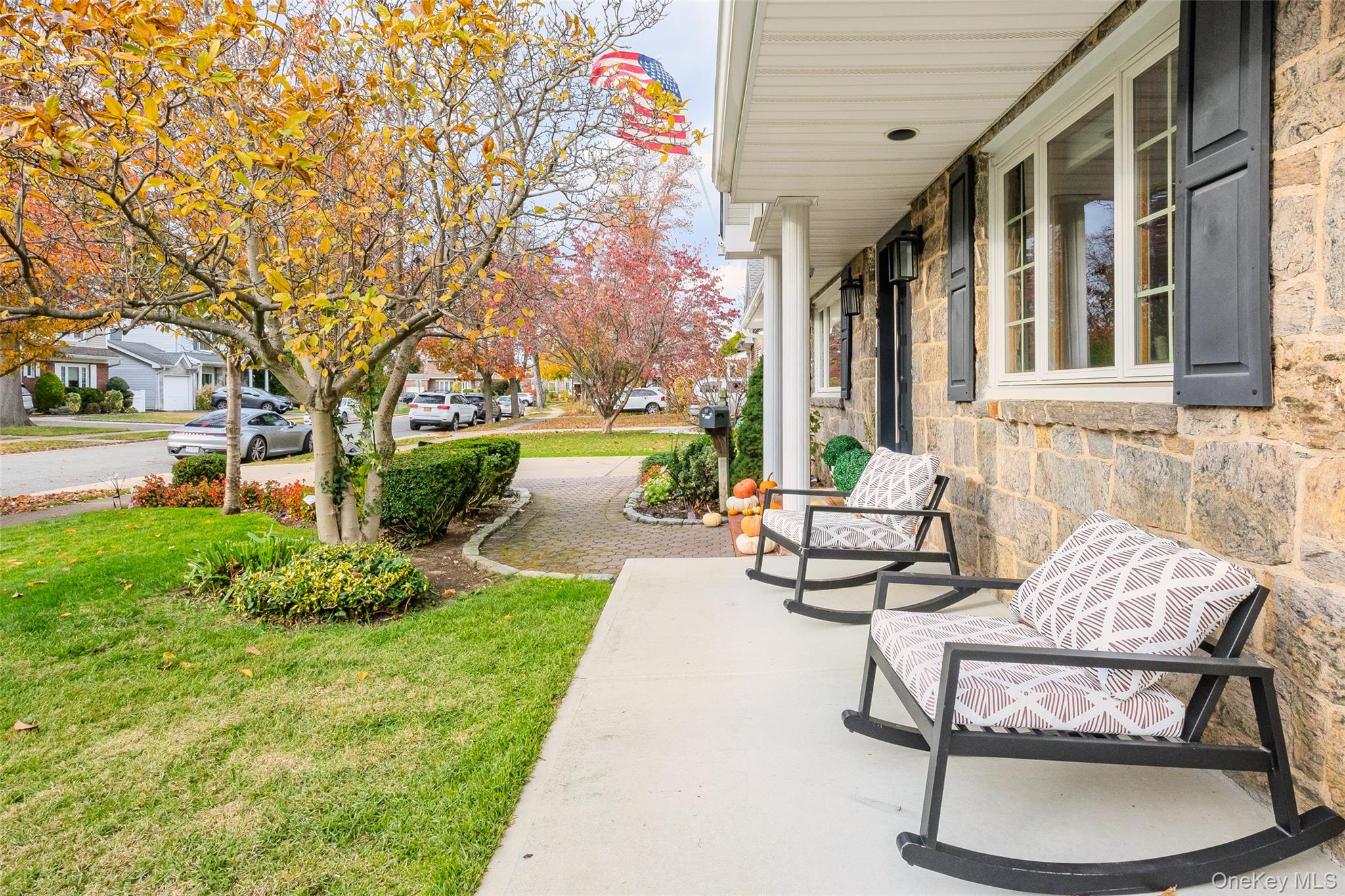 8 Willow Road New Hyde Park, NY 11040 - Photo 2 of 34 a view of a patio with couches table and chairs and potted plants