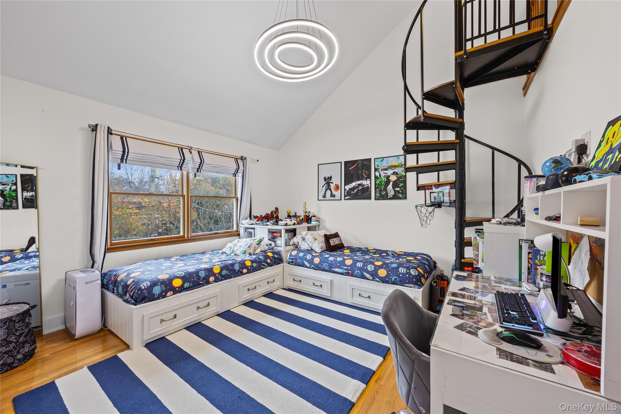 8 Willow Road New Hyde Park, NY 11040 - Photo 21 of 34 a living room with furniture and a floor to ceiling window