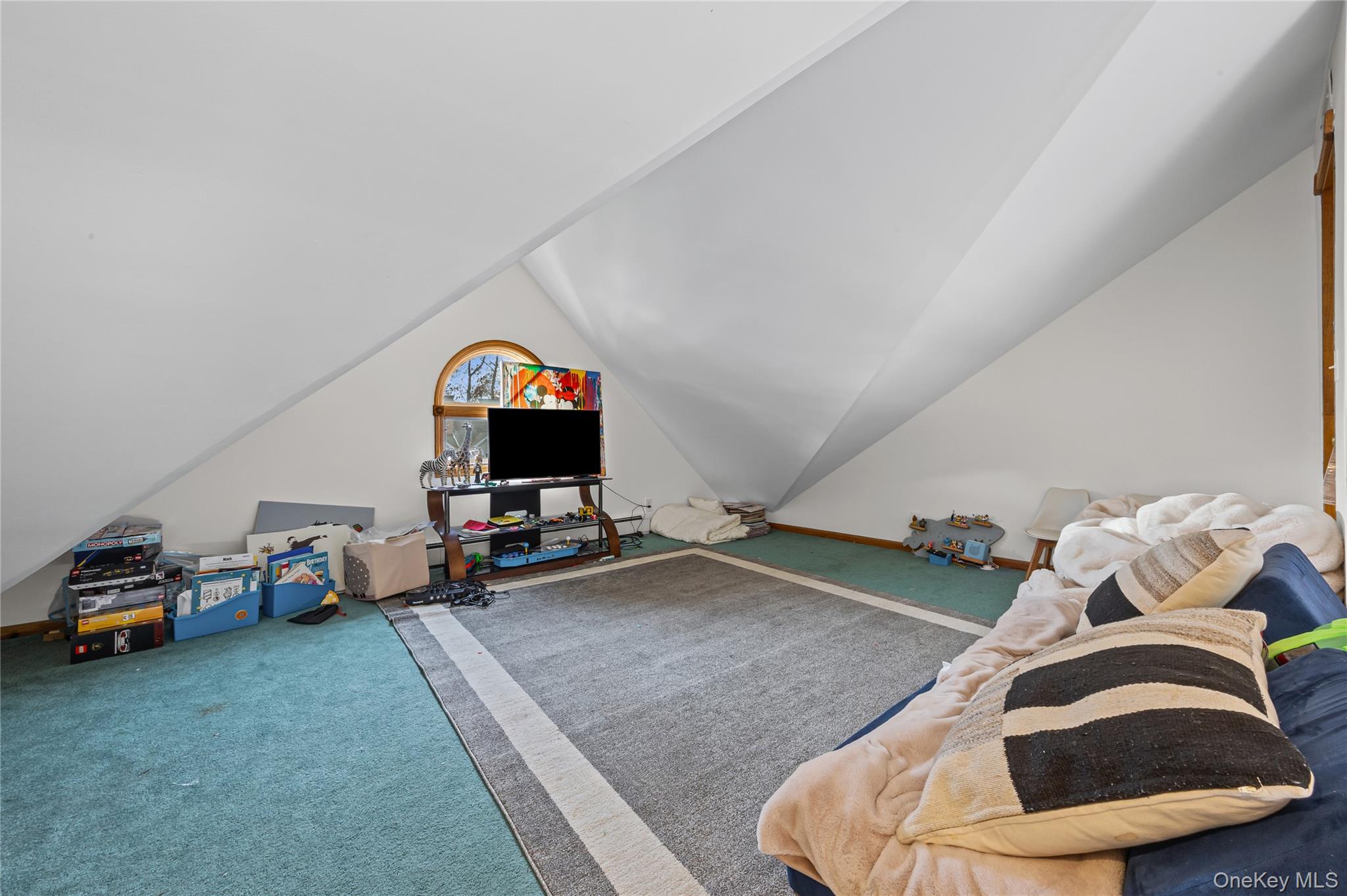 8 Willow Road New Hyde Park, NY 11040 - Photo 22 of 34 a living room with furniture and a couch