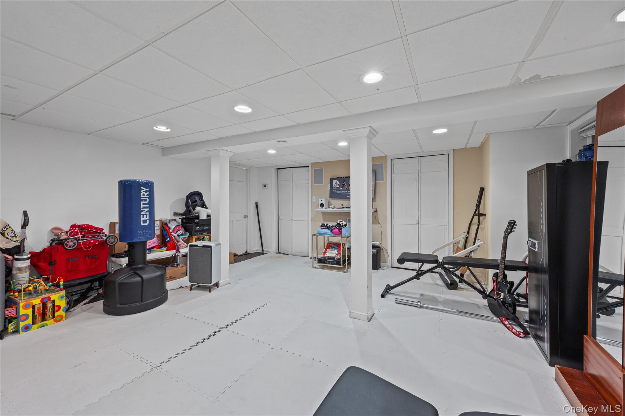 8 Willow Road New Hyde Park, NY 11040 - Photo 23 of 34 a view of a room with gym equipment