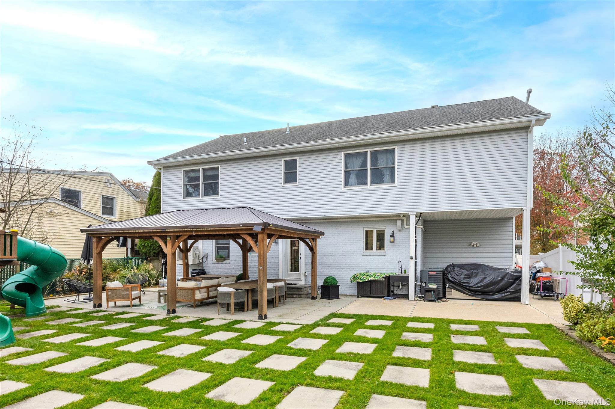 8 Willow Road New Hyde Park, NY 11040 - Photo 25 of 34 a view of a house with patio