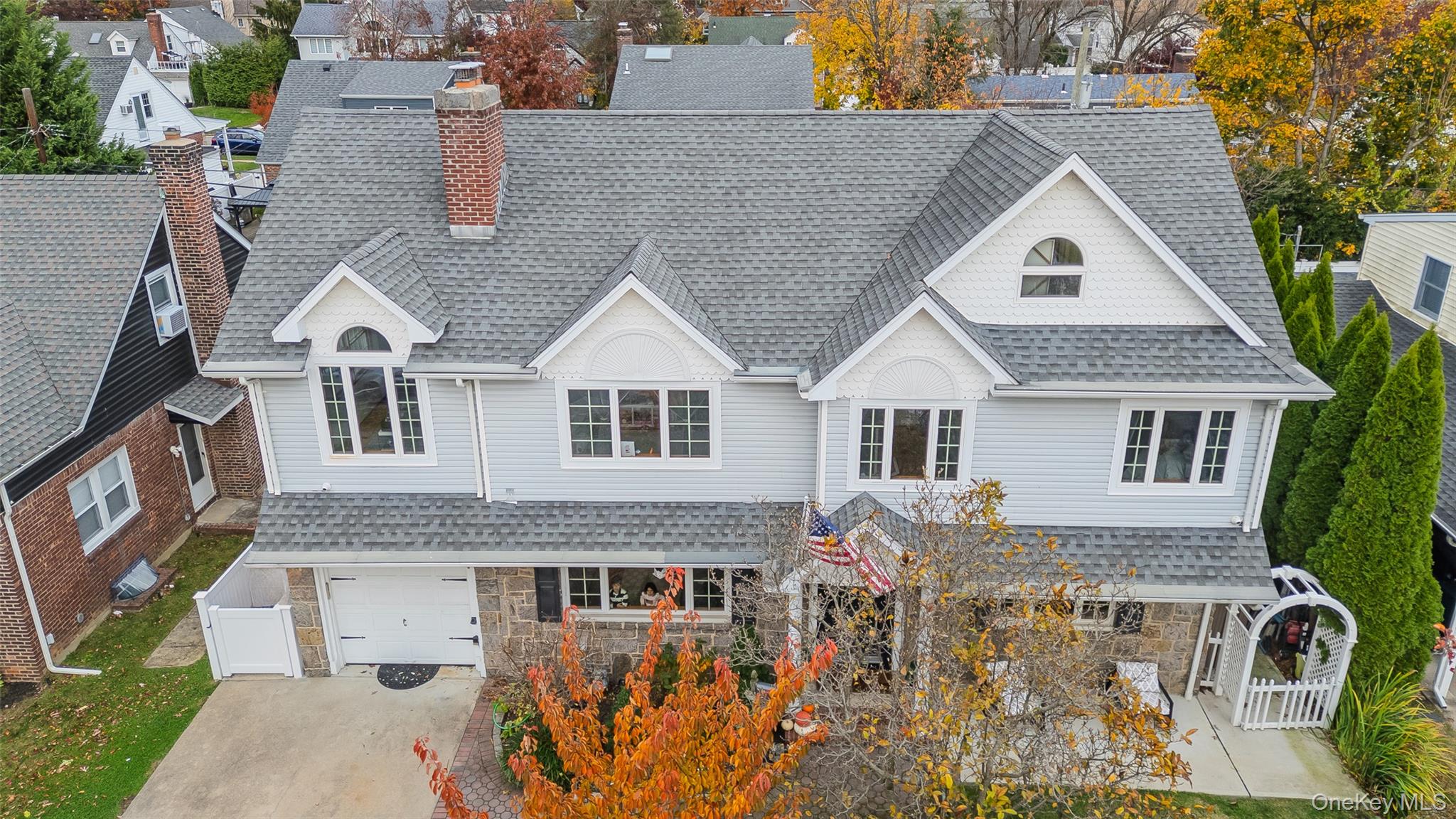 8 Willow Road New Hyde Park, NY 11040 - Photo 33 of 34 a view of front a house with a yard