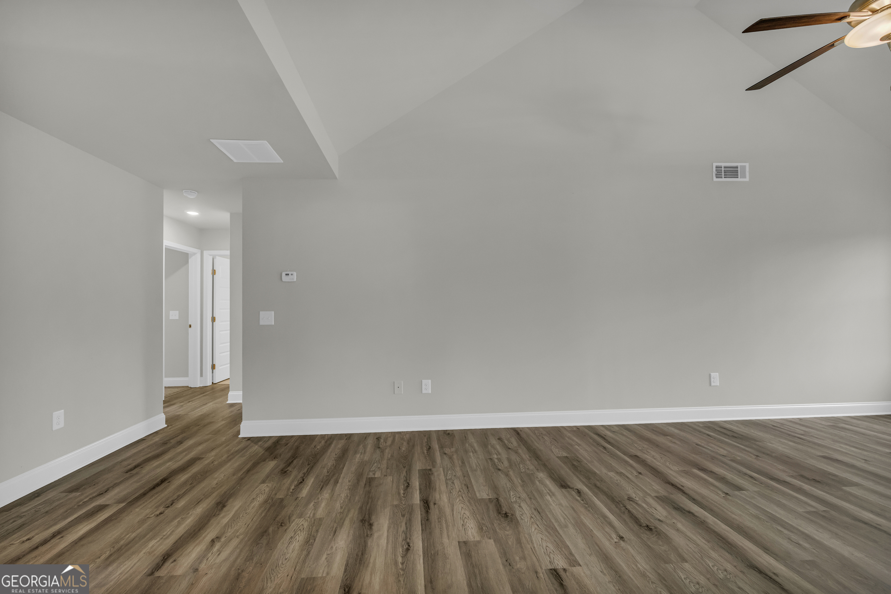 86 Sewell Road Lavonia, GA 30553 - Photo 11 of 67 a view of an empty room and wooden floor