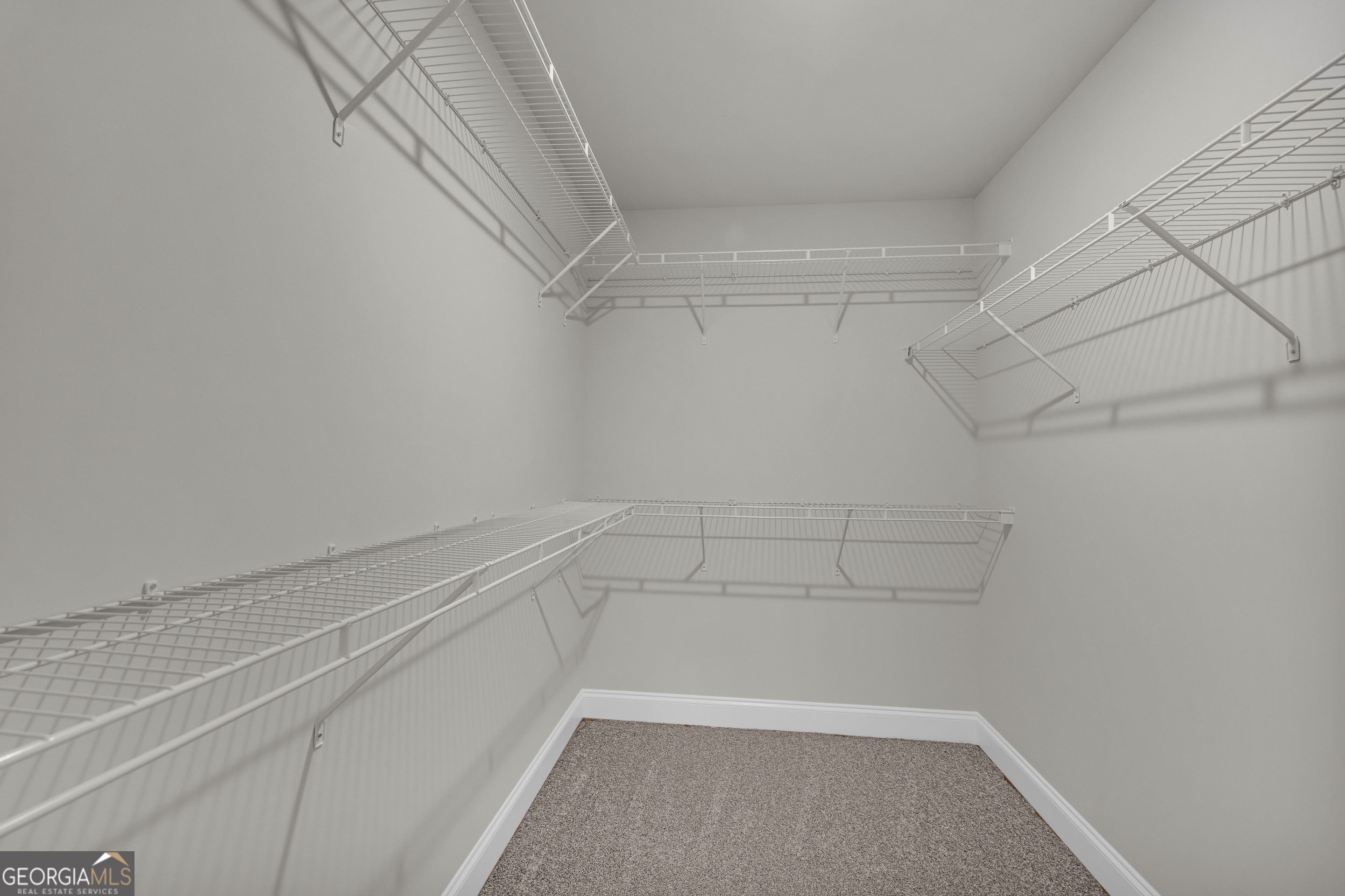 86 Sewell Road Lavonia, GA 30553 - Photo 49 of 67 a view of a room with racks on the wall