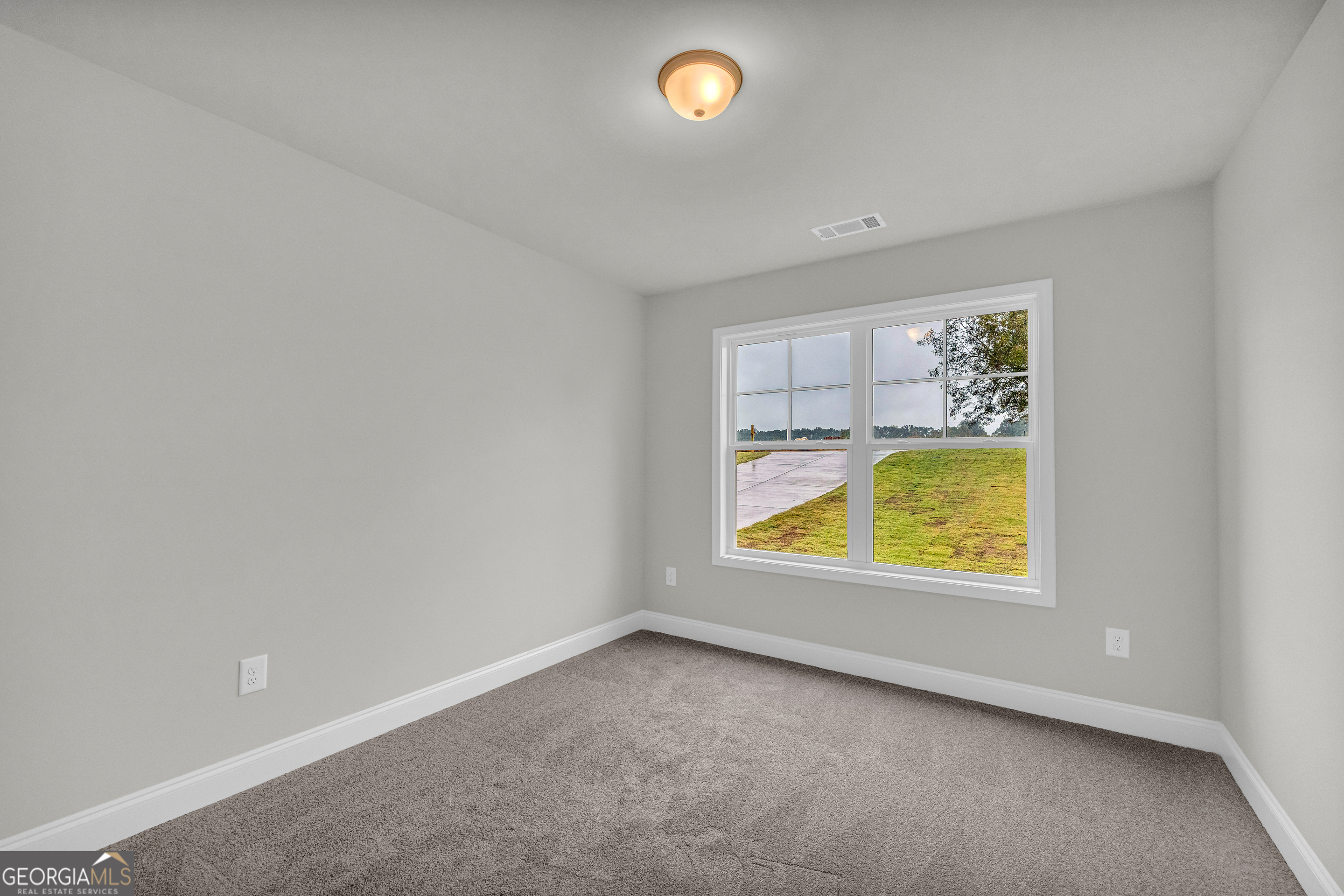 86 Sewell Road Lavonia, GA 30553 - Photo 50 of 67 an empty room with a window
