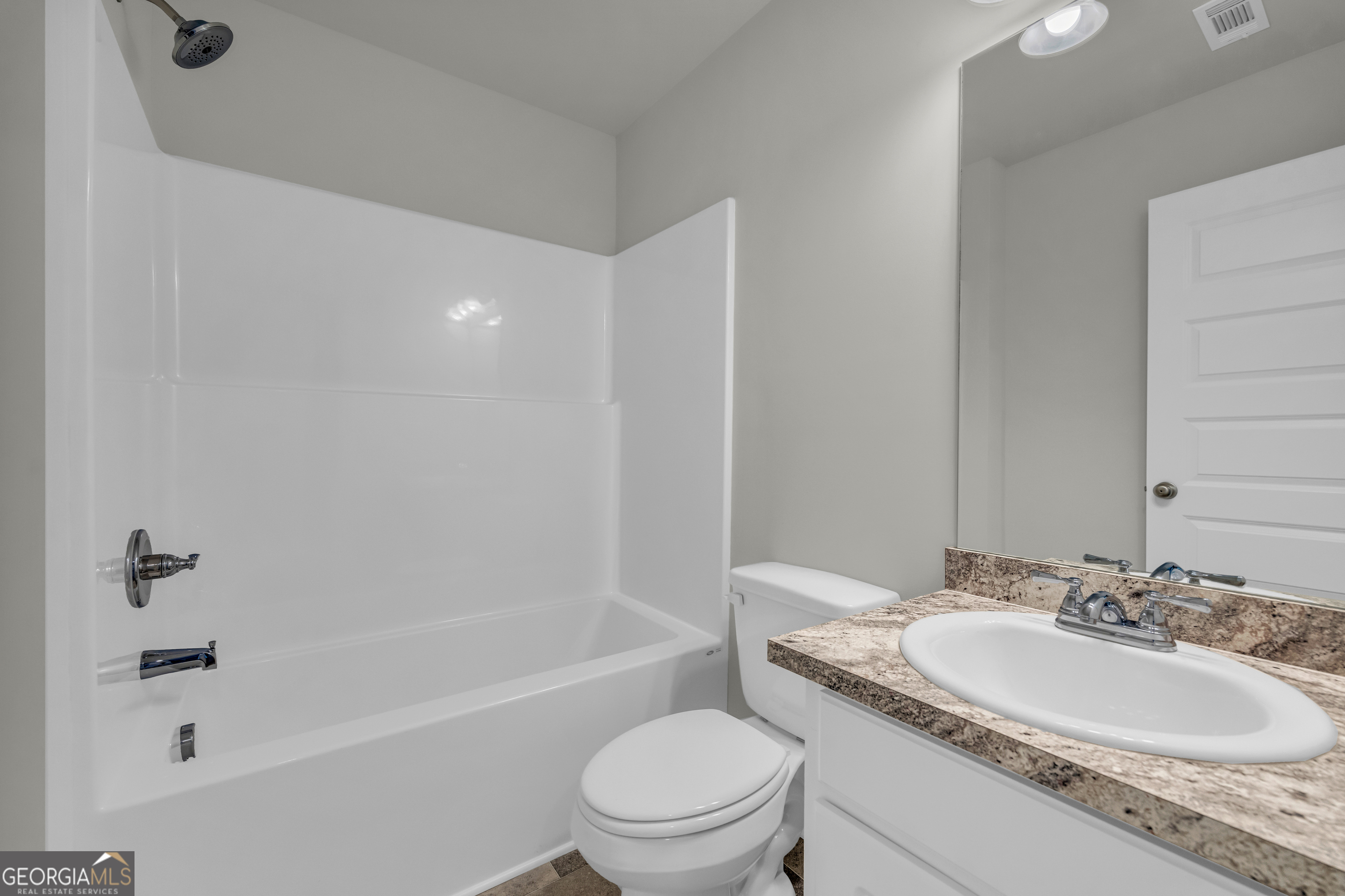 86 Sewell Road Lavonia, GA 30553 - Photo 54 of 67 a bathroom with a granite countertop sink toilet and shower