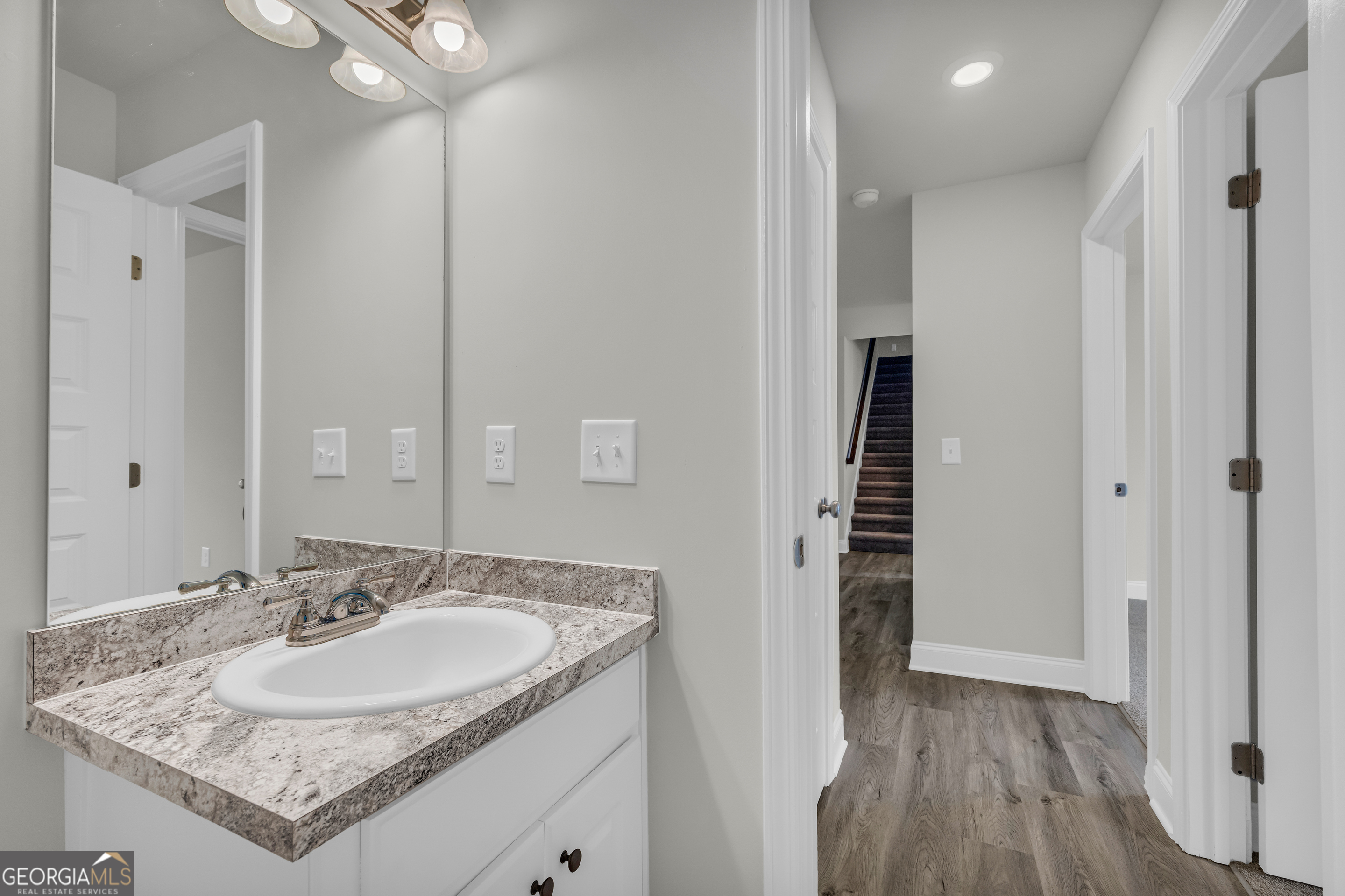 86 Sewell Road Lavonia, GA 30553 - Photo 55 of 67 a bathroom with a sink and a mirror