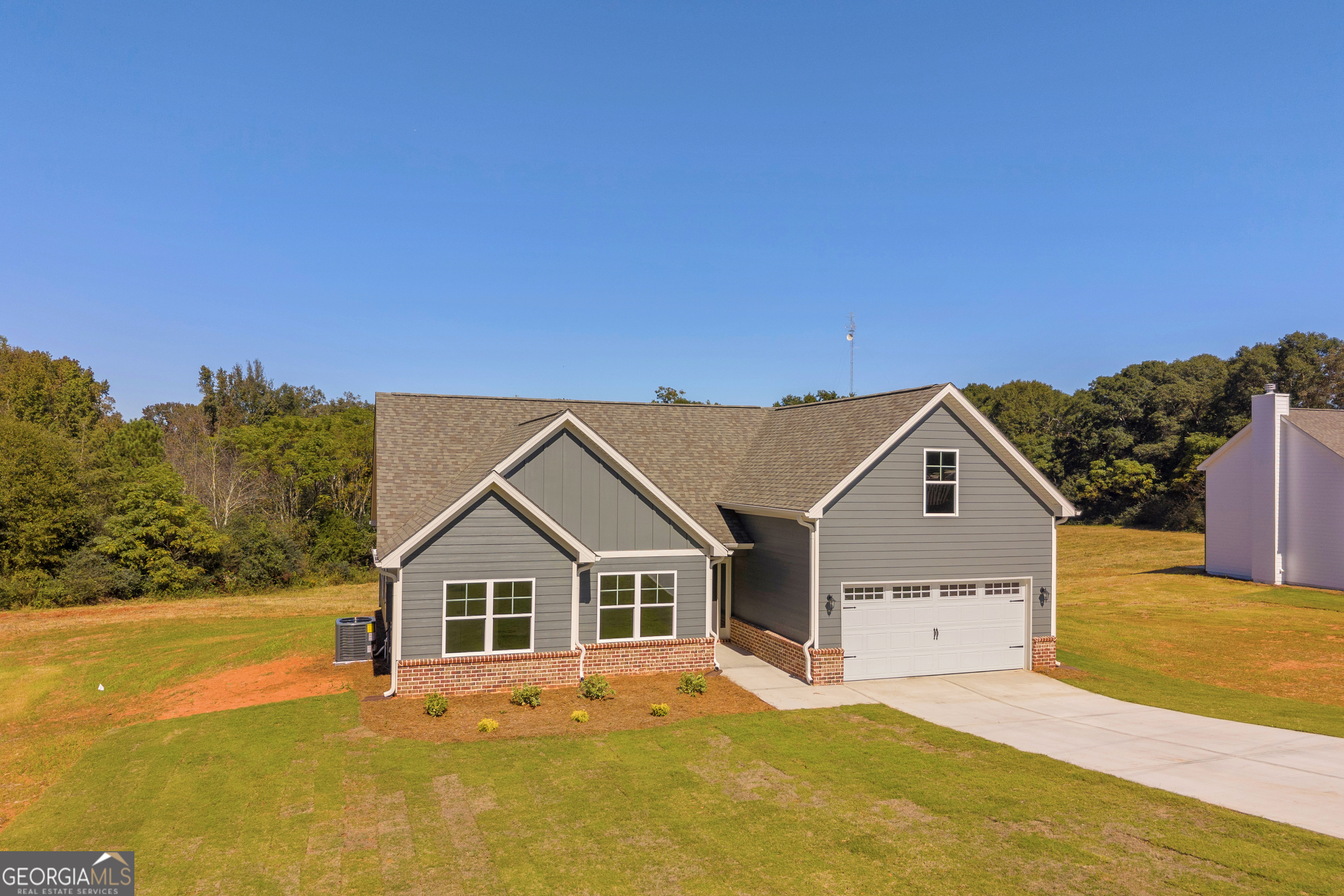86 Sewell Road Lavonia, GA 30553 - Photo 63 of 67 a front view of a house with a yard
