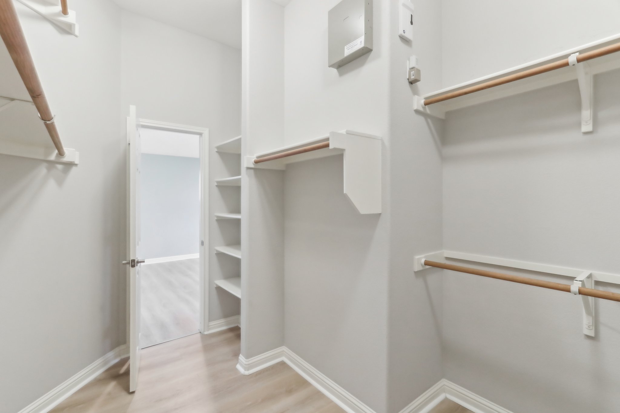 10108 Channel Island Drive Austin, TX 78747 - Photo 28 of 36 Walk in closet with light wood-style flooring