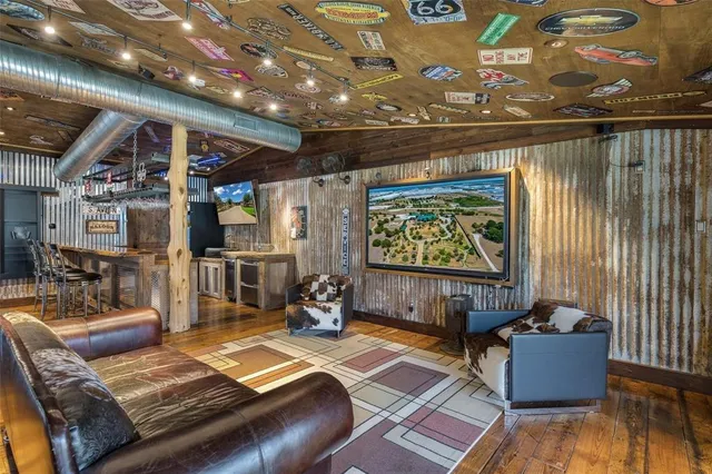 a view of a chairs and tables in the patio