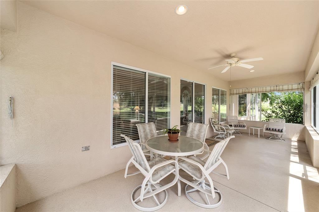 12896 Southeast 91st Terrace Road Summerfield, FL 34491 - Photo 40 of 77 a dining room with furniture window and outside view