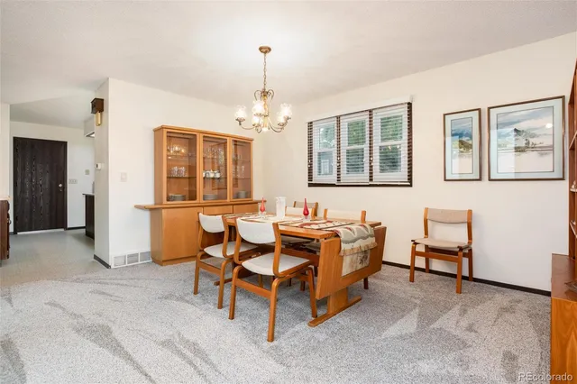 a living room with furniture and windows