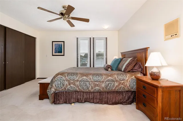 a view of kitchen with stainless steel appliances granite countertop a sink and a refrigerator