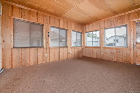 a view of an empty room with a empty shelves