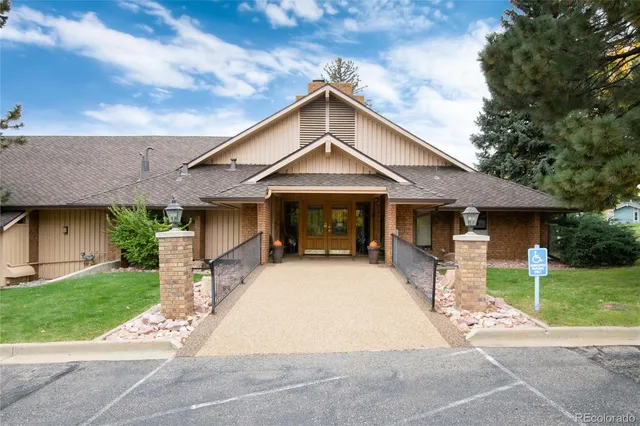 a view of backyard with small swimming pool and deck